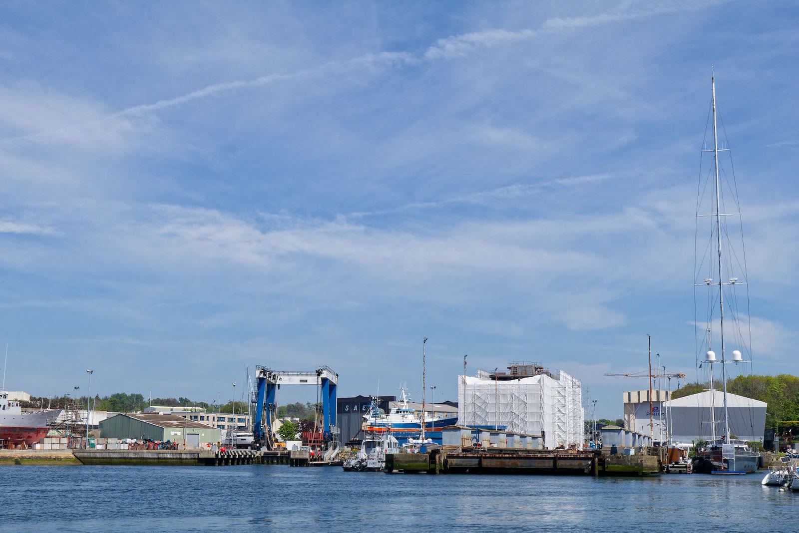 The harbour with the travel lift and boats on their moorings.